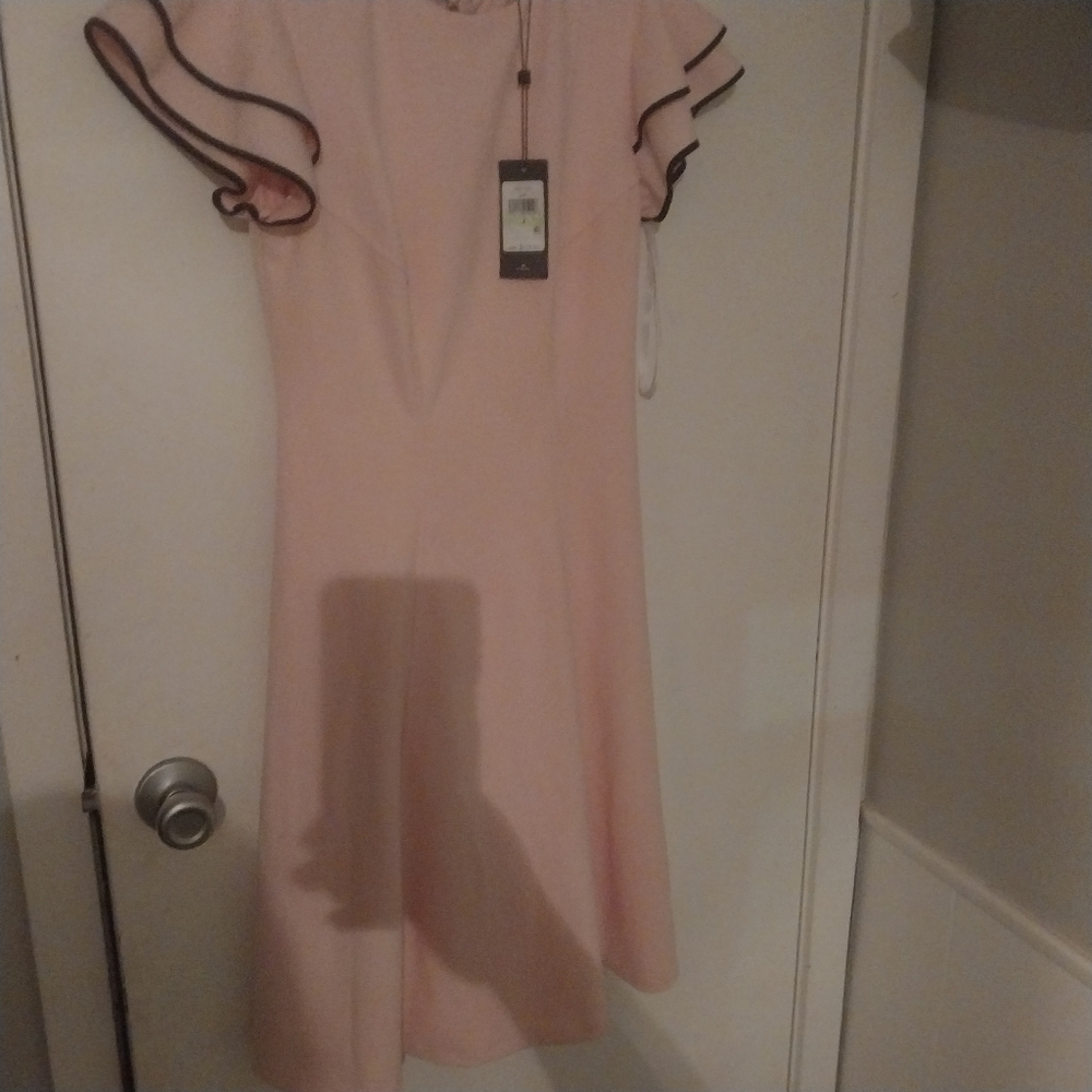 Elegant Pink Ruffle Sleeve Dress  The brand is TOMMY HILFIGER and Size is 4
